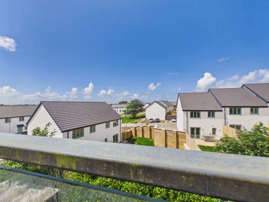 Lot: 85 - MODERN TWO-BEDROOM SECOND FLOOR APARTMENT WITH PARKING - View from Juliet balcony in living room